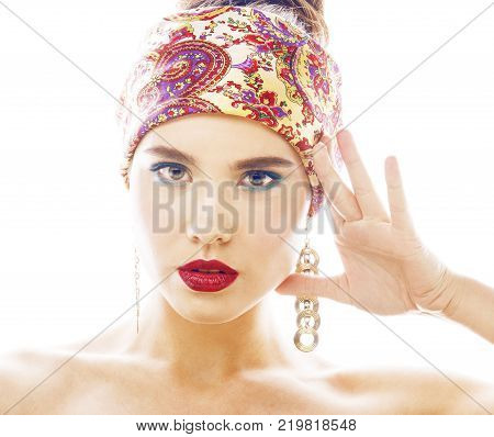 young pretty modern girl with bright shawl on head emotional posing isolated on white background, asian people ethnicity