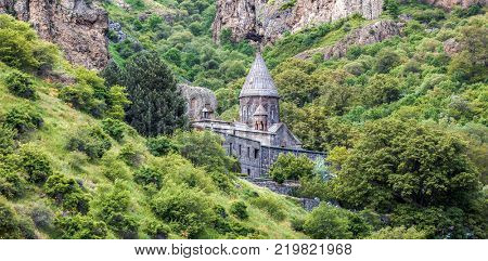 Old UNESCO object Geghard monastyr - Armenia summer day. Exploring Armenia