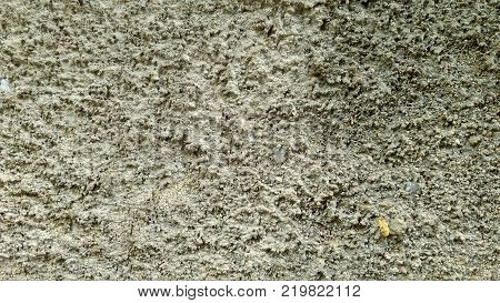 Old vintage cement messy cracked wall, grunge brick textured background, panoramic photo