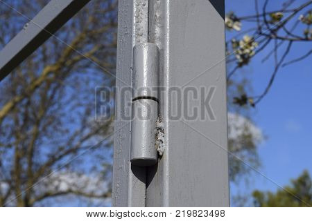 The welded canopies for gate. Installation of gate in a fence.