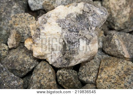 Stone texture Crushed stone ballast grey rocky slopes