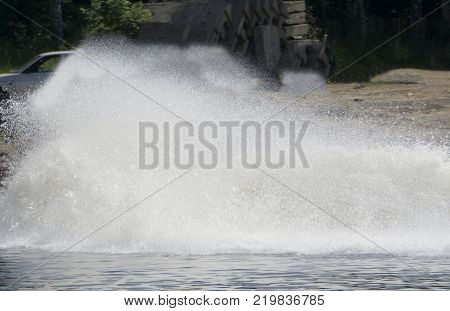 wall spray from the jet ski the spray from the motorcycle