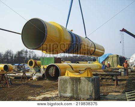 Sakhalin, Russia - 12 November 2014: Construction of the gas pipeline on the ground. Transportation of energy carriers.