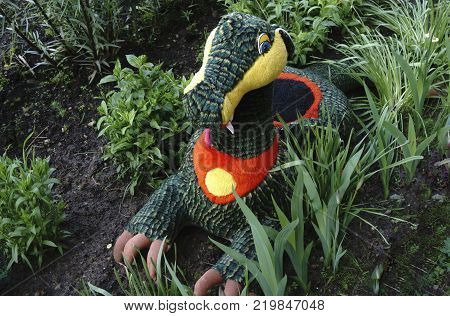 wooden figure of the person for decoration of a garden or giving