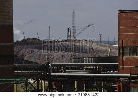Salt production in the Saline With excavator and transportation belt conveyor sea salt is transported on salt hills.