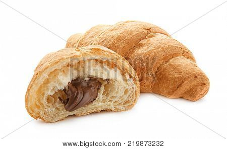 Yummy fresh croissant with chocolate on white background