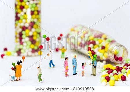 miniature child wants to have a balloon