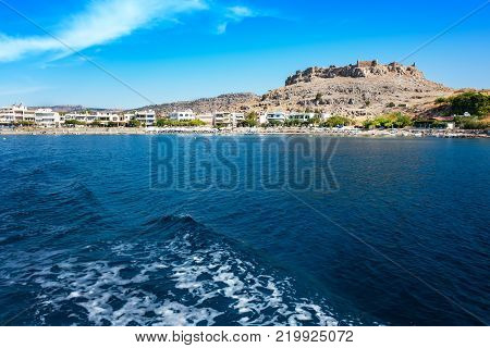 View of Haraki beach with ruins of Feraklos castle (RHODES GREECE)