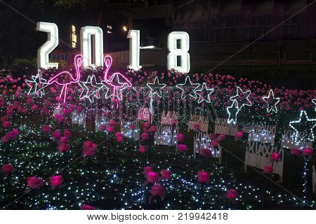 BANGKOK , THAILAND - DECEMBER 14 , 2017 : Flower and star light decorated beautiful New Year Celebration 2018 at Esplanade Cineflex for Happy New Year event in Bangkok city,Thailand.