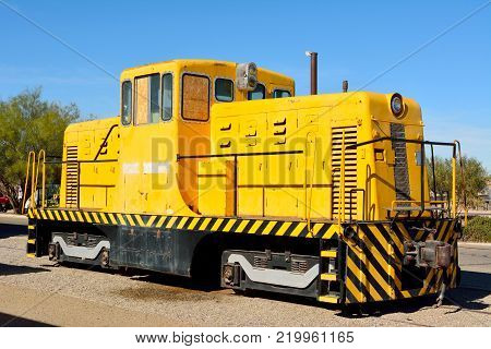 Barstow, California, United States of America - November 26, 2017. Historic locomotive along railroad tracks in Barstow, CA.