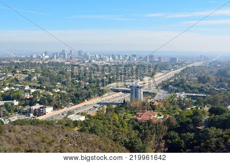 View over Los Angeles toward Century City district and San Diego freeway.
