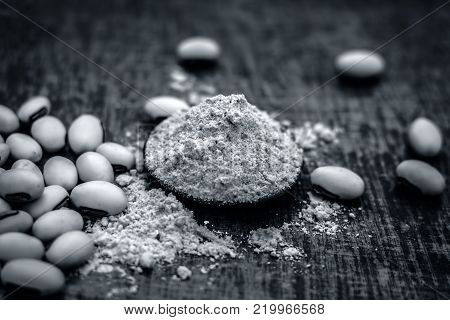 Close Up Of Ayurvedic Herb Kuanch,cowhage,mucuna Pruriens With Powder.