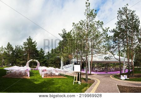 Outdoor wedding ceremony and banquet wedding tent.