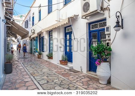 Spetses Island, Greece- August 1, 2019. Walking On Traditioanal Greek Streets, Spetses Saronic Gulf,
