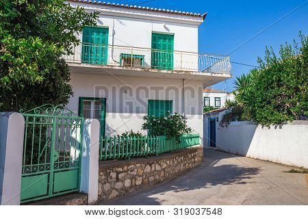 Walking On Traditioanal Greek Streets, Spetses Saronic Gulf, Greece
