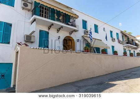 Walking On Traditioanal Greek Streets With White House, Spetses Saronic Gulf, Greece