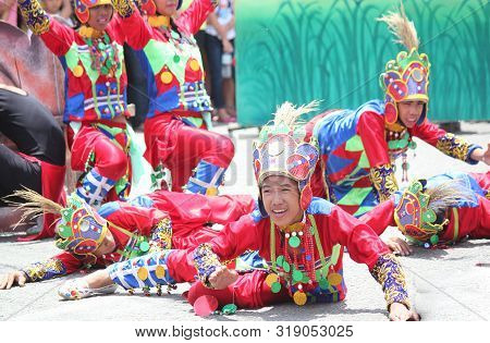 Davao City, Philippines-august 2014: Parade Participants Perform A Lively Presentation At The Street