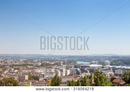 Aerial Panoramic View Of Lyon With The Outskirts And Suburbs Of Lyon Visible In Background And Rhone