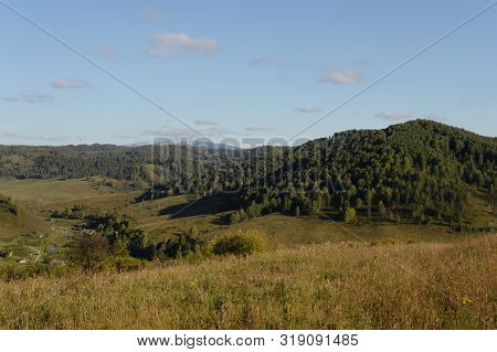 Landscape In The Vicinity Of The Taiga Village Generalka In The Mountains Of The Altai Territory. We