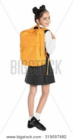 Happy Girl In School Uniform On White Background