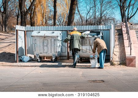 Garbage Collection. Public Service. Workers Tidying Up In The Yard