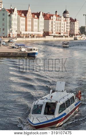 Kaliningrad, Russia - August 24, 2019: View Of The Fish Village And Lighthouse On The Embankment Of 