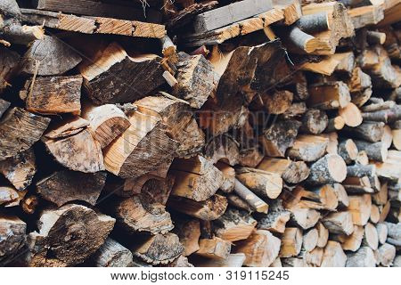 Pile Of Firewood. Preparation Of Firewood For The Winter And Use For Cooking, Firewood Background, S