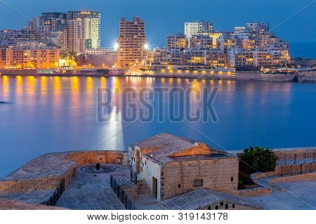 Night View Of The Modern Sliema District And The Tignes Waterfront. Malta.