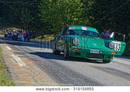 Chamrousse, France, August 25, 2019 : Historic Racing Cars Drive To The Start Of Uphill Race, Counti
