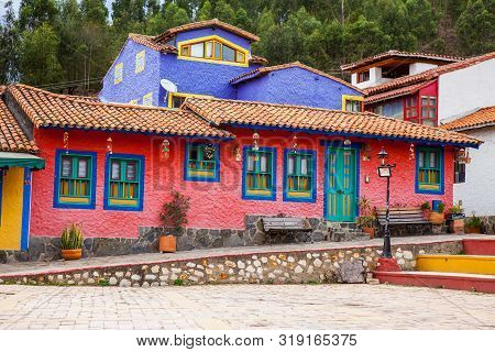Duitama, Colombia - August, 2019: Beautiful Facades Of The Houses At The Touristic Place Called Pueb
