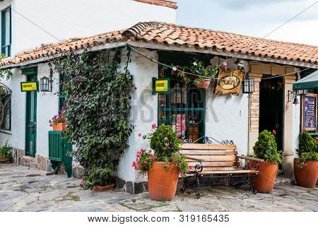 Duitama, Colombia - August, 2019: Beautiful Facades Of The Houses At The Touristic Place Called Pueb