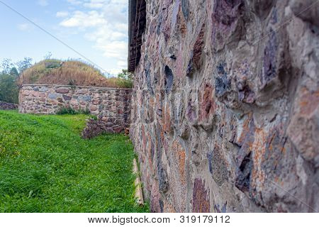 Karela Fortress - Part Of The Masonry Of The Fortress Wall And Fortifications That Are Overgrown Wit
