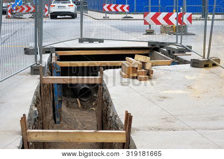 Engineering Works. Repair Of Urban Underground Communications. Utility Infrastructure. Deep Hole For