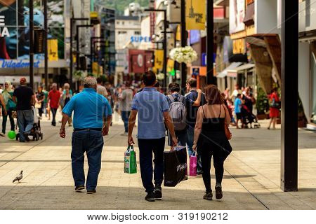 Andorra La Vella, Andorra : 2019 August 22 :  Andorra La Vella. People Walk In The Comercial Street 