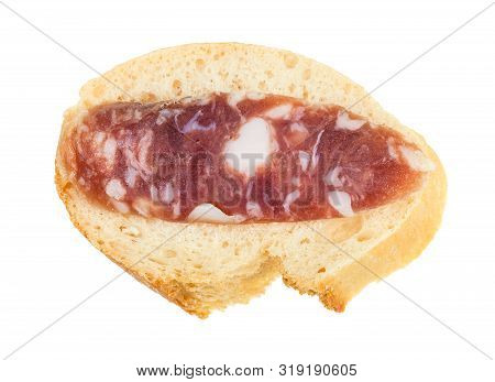Top View Of Open Sandwich With Fresh Bread And Slice Of Cured Sausage Isolated On White Background