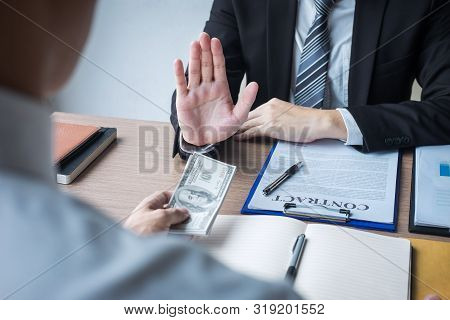 Anti Bribery And Corruption Concept, Business Man Refusing And Don't Receive Money Banknote Offer Fr