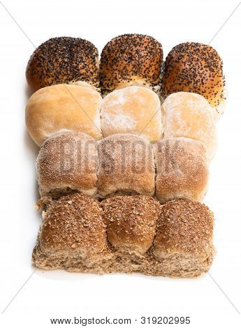 Wholemeal  Multiseeds Batch Rolls Isolated On White Batch Of Four