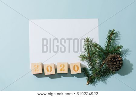 Happy New Year Composition. Paper Sheet, 2020 Number, Fir Branch With Cone.