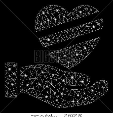Glowing Mesh Sick Heart Care Hand With Glare Effect. Abstract Illuminated Model Of Sick Heart Care H