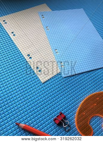 Back To School Concept. Sudent Tools On Blue Background.