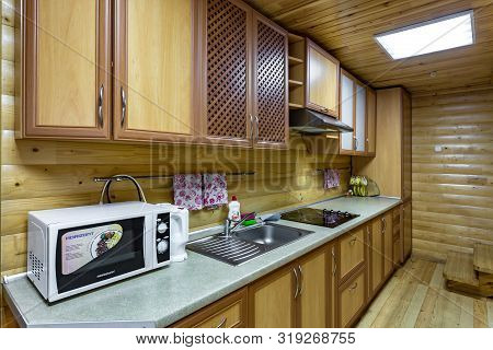 Grodno, Belarus - August, 2019: Interior Of Hall Interior Of Eco Kitchen With Wooden Furniture