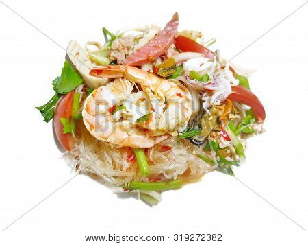 Thai Food Style, Selective Focus Of Spicy Vermicelli Salad With Seafood Isolated On White Background