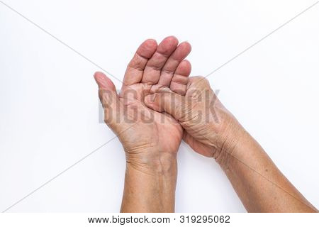 Senior Woman's Hand Doing Herself Massage  Isolated On White Background, About Massage Concept
