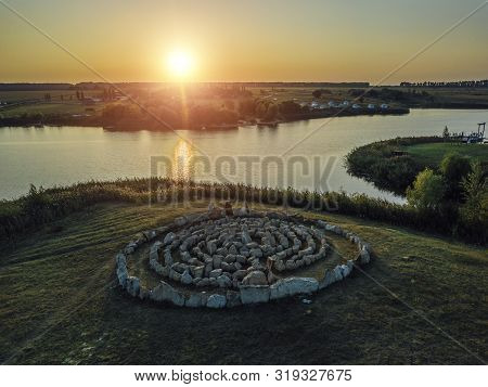 Spiral Labyrinth Made Of Stones, On Sunset Lake