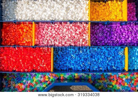 Iron Beads Sorted By Color In Little Boxes  In A Specially For This Purpose Made Case
