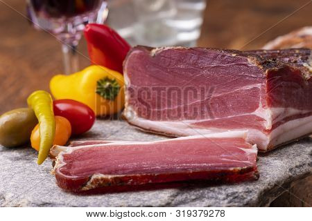 Closeup Of South Tyrolean Speck On Granite