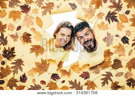 Autumn Couple Wearing In Autumn Clothes And Looks Very Sensually. Romantic Couple Wearing Pullover O