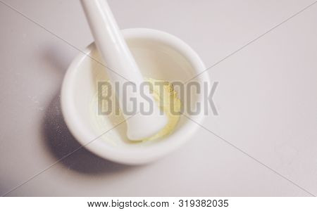 Hemical (powder) In Porcelain Container. Laboratory And Medical