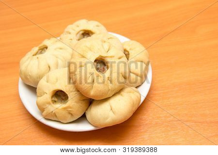 Vak Belyash - Bashkir National Cuisine, Homemade Meat Pies In White Bowl Over Wooden Background