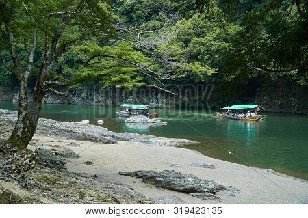 Katsura River,kyoto,japan - July 7,2019 : Tourists On The Boats In The Katsura River